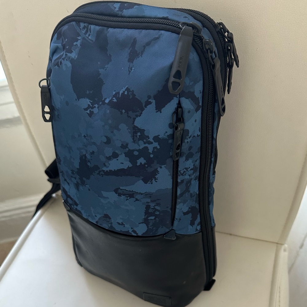 Tumi crossbody backpack